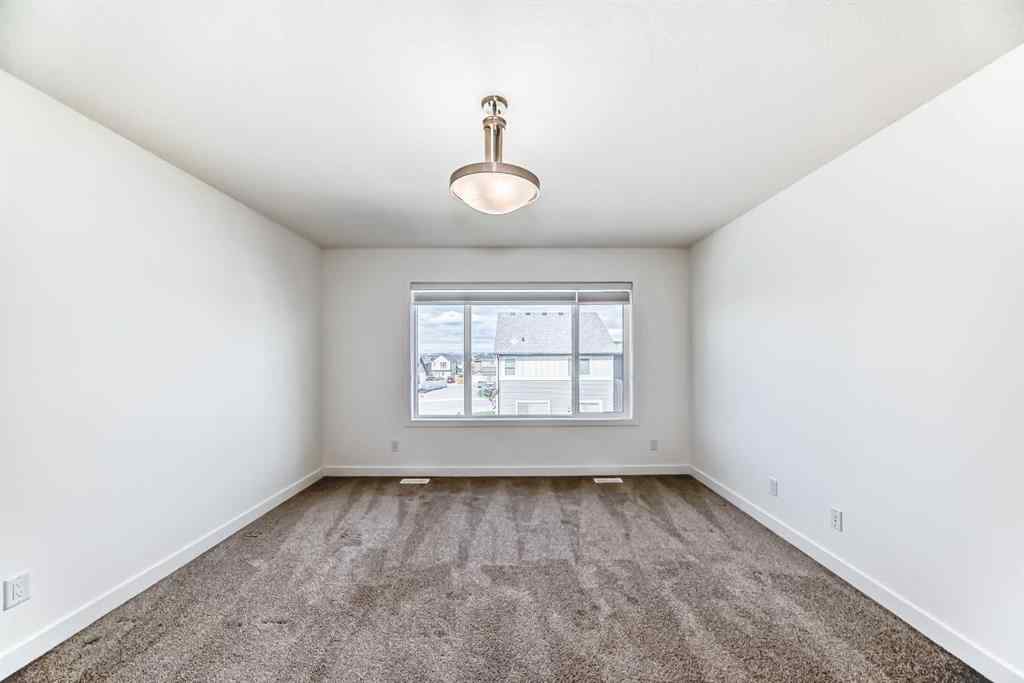 MLS® A2240430 - 99 Lawrence Green SE in Lanark Airdrie, Residential