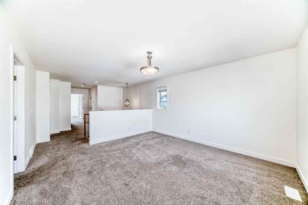 MLS® A2240430 - 99 Lawrence Green SE in Lanark Airdrie, Residential