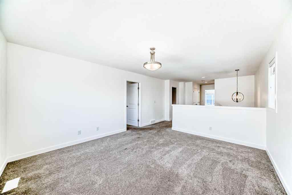 MLS® A2240430 - 99 Lawrence Green SE in Lanark Airdrie, Residential