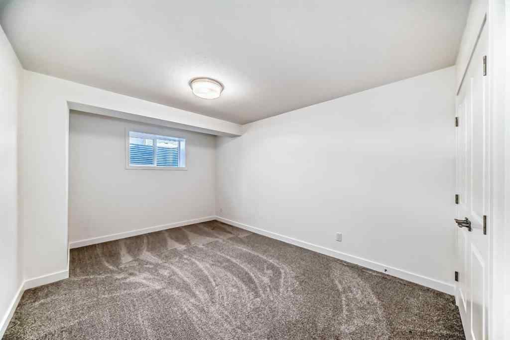 MLS® A2240430 - 99 Lawrence Green SE in Lanark Airdrie, Residential