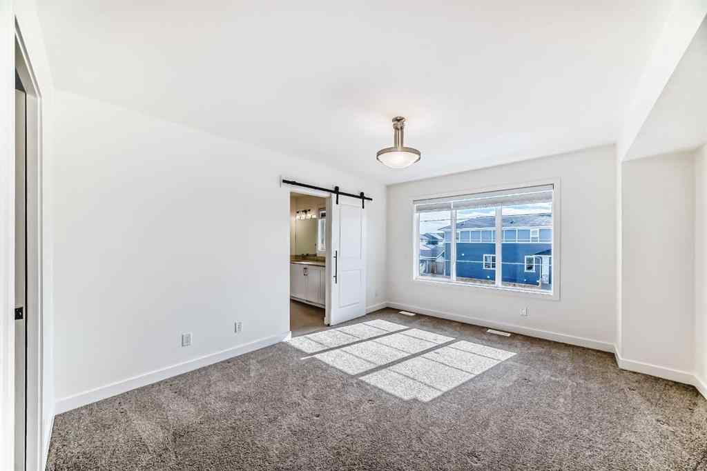 MLS® A2240430 - 99 Lawrence Green SE in Lanark Airdrie, Residential