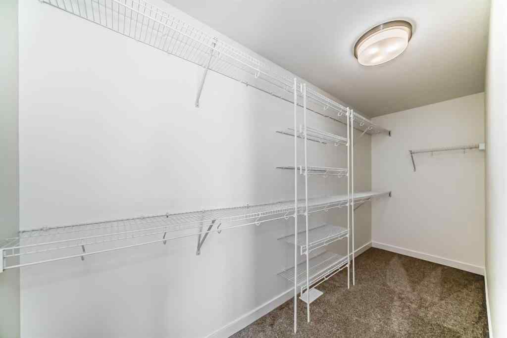 MLS® A2240430 - 99 Lawrence Green SE in Lanark Airdrie, Residential