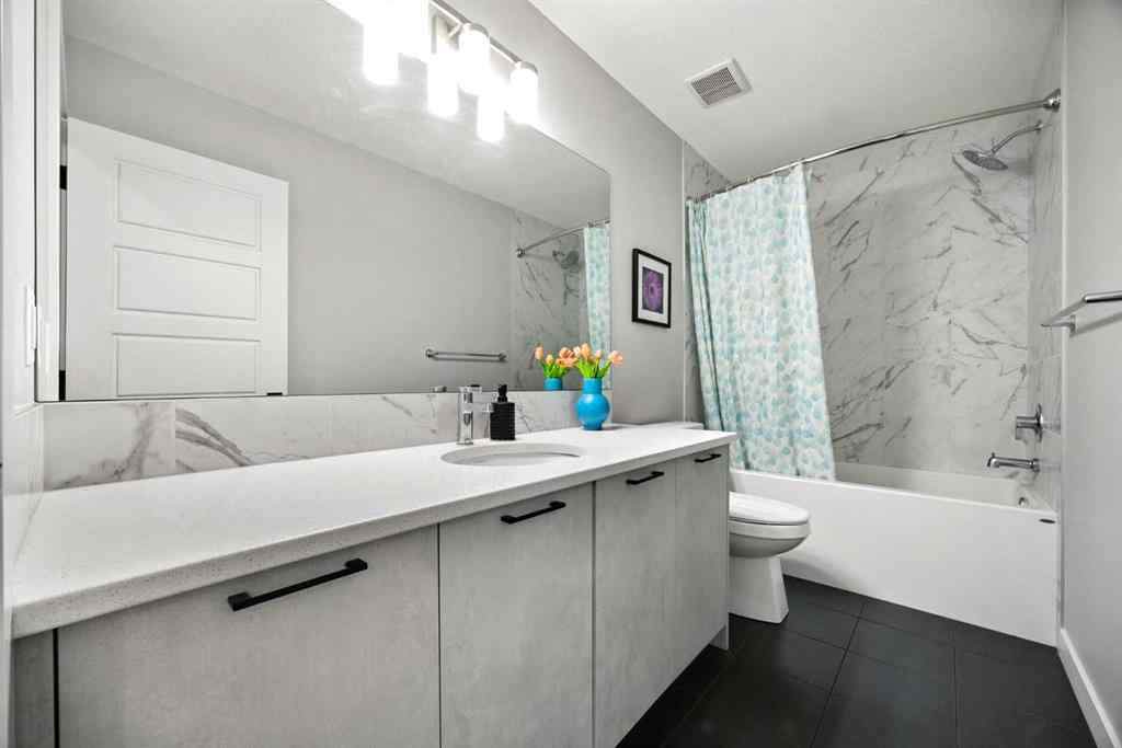 MLS® A2240470 - 97 Amblehurst Gardens NW in Moraine Calgary, Residential