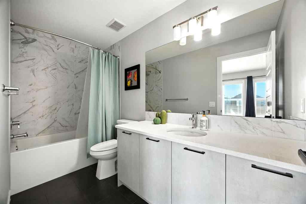 MLS® A2240470 - 97 Amblehurst Gardens NW in Moraine Calgary, Residential