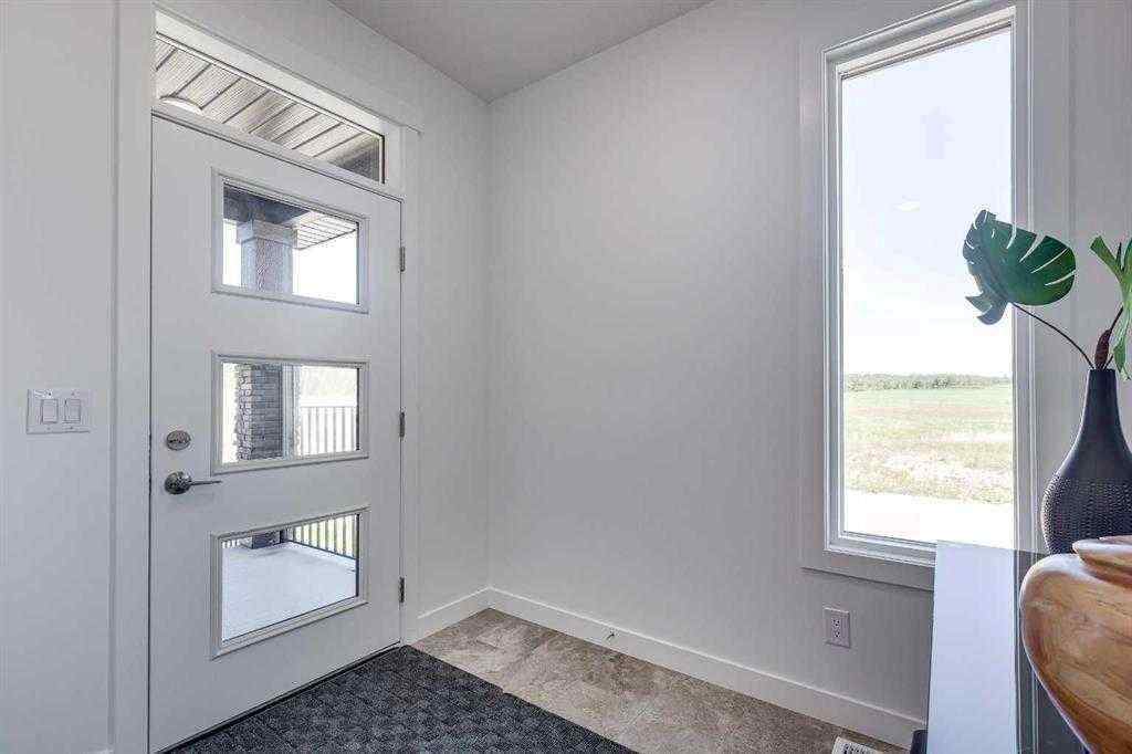 MLS® A2240478 - 4240 Bauman Way  in Bella Vista Innisfail, Residential