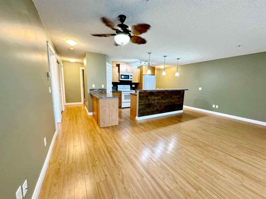 MLS® A2240492 - Unit #2126 700 Willowbrook Road NW in Willowbrook Airdrie, Residential