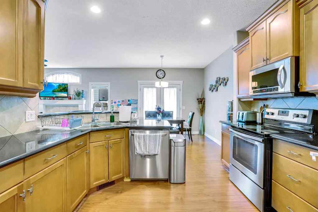 MLS® A2240515 - 57 Saddleland Drive NE in Saddle Ridge Calgary, Residential