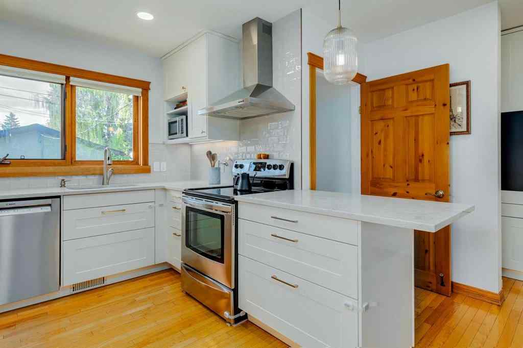 MLS&reg; # A2240533 - 1403 107 Avenue SW in Southwood Calgary, Residential Open Houses