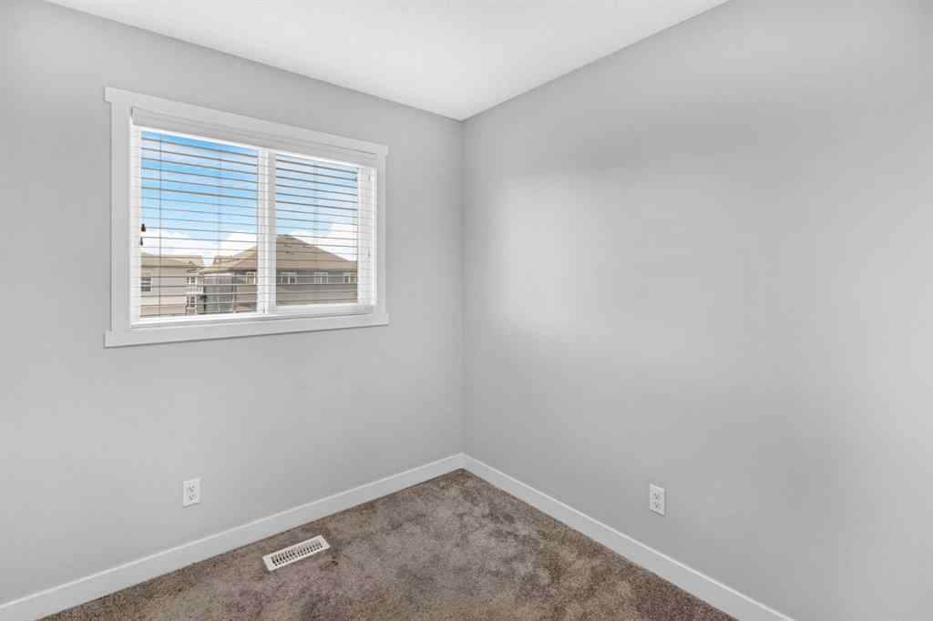MLS® A2240582 - 712 Savanna Boulevard NE in Saddle Ridge Calgary, Residential