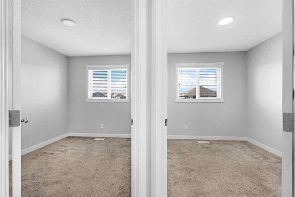 MLS® A2240582 - 712 Savanna Boulevard NE in Saddle Ridge Calgary, Residential