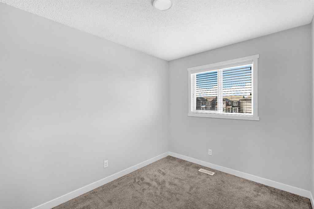 MLS® A2240582 - 712 Savanna Boulevard NE in Saddle Ridge Calgary, Residential
