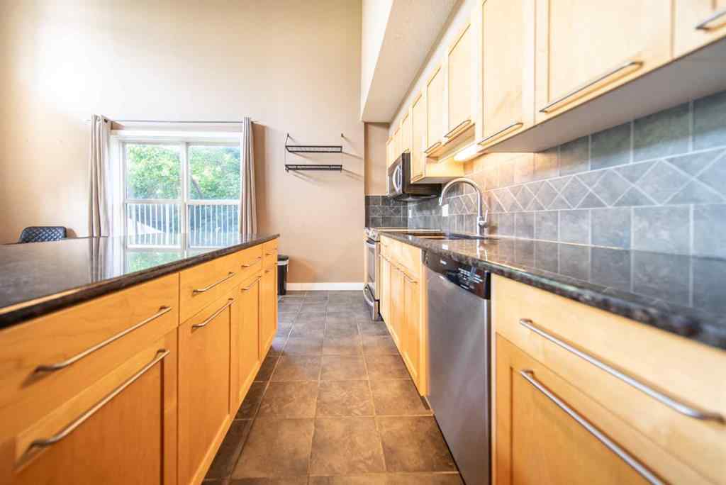 MLS® A2240628 - Unit #102 1505 27 Avenue SW in South Calgary Calgary, Residential