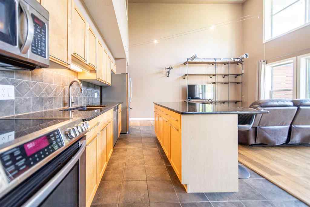 MLS® A2240628 - Unit #102 1505 27 Avenue SW in South Calgary Calgary, Residential