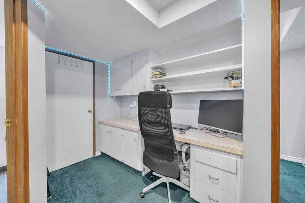 MLS® A2240643 - 303 Ranchridge Bay NW in Ranchlands Calgary, Residential