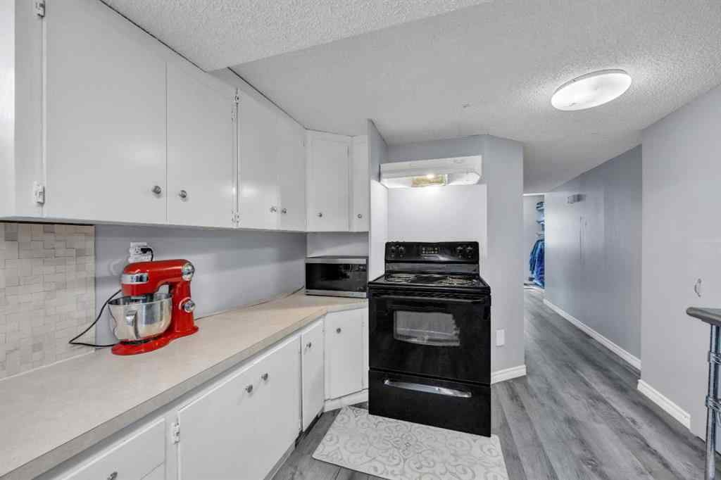 MLS® A2240643 - 303 Ranchridge Bay NW in Ranchlands Calgary, Residential
