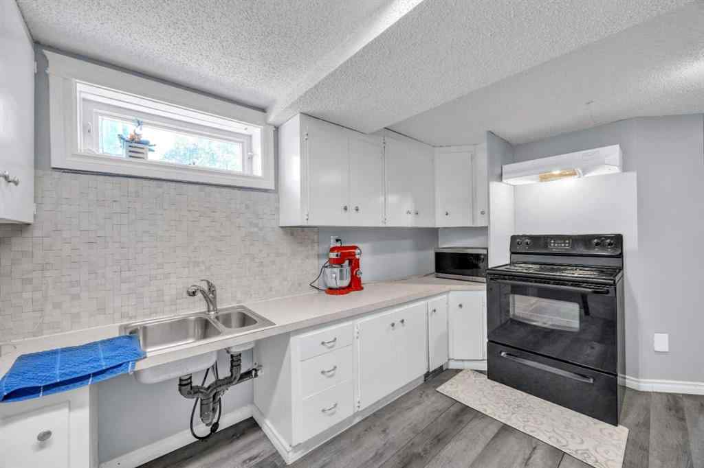 MLS® A2240643 - 303 Ranchridge Bay NW in Ranchlands Calgary, Residential