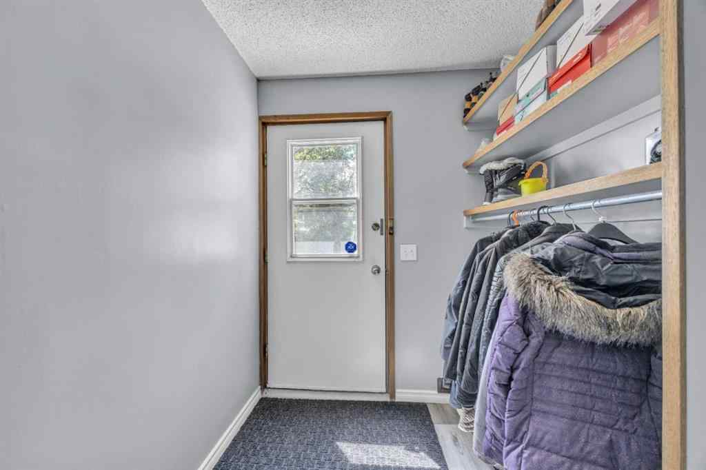 MLS® A2240643 - 303 Ranchridge Bay NW in Ranchlands Calgary, Residential
