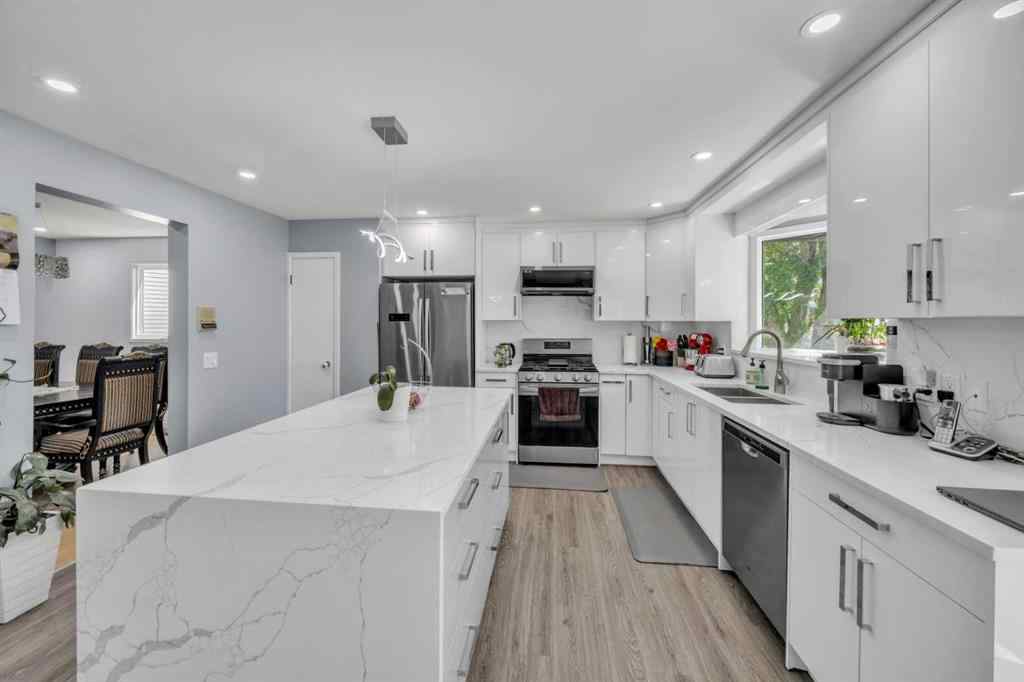 MLS® A2240643 - 303 Ranchridge Bay NW in Ranchlands Calgary, Residential