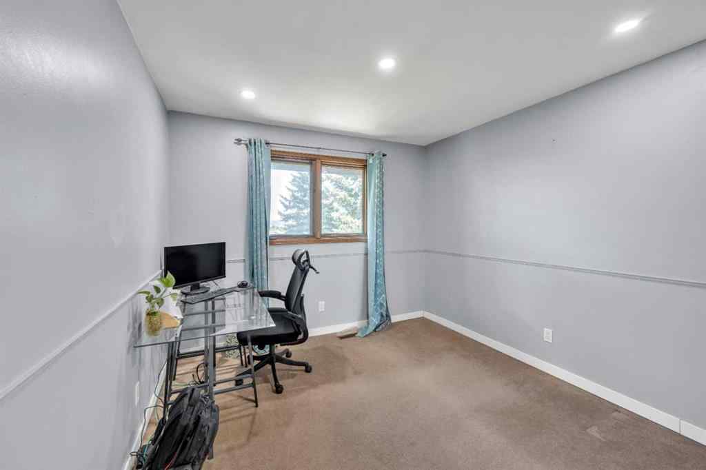 MLS® A2240643 - 303 Ranchridge Bay NW in Ranchlands Calgary, Residential