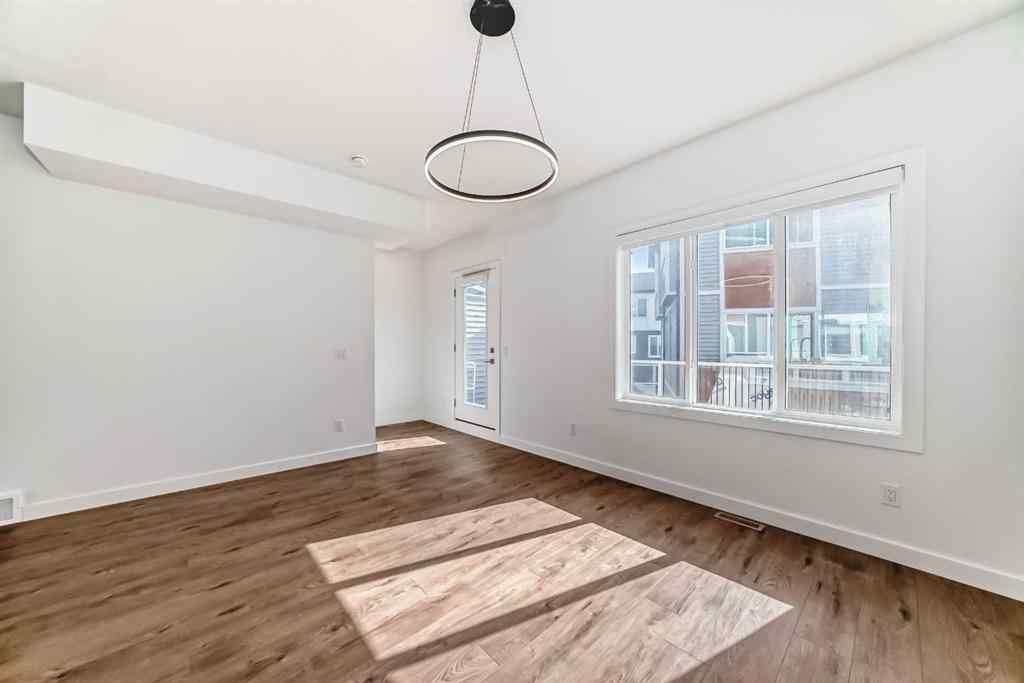 MLS® A2240680 - Unit #605 335 Creekside Boulevard SW in Pine Creek Calgary, Residential