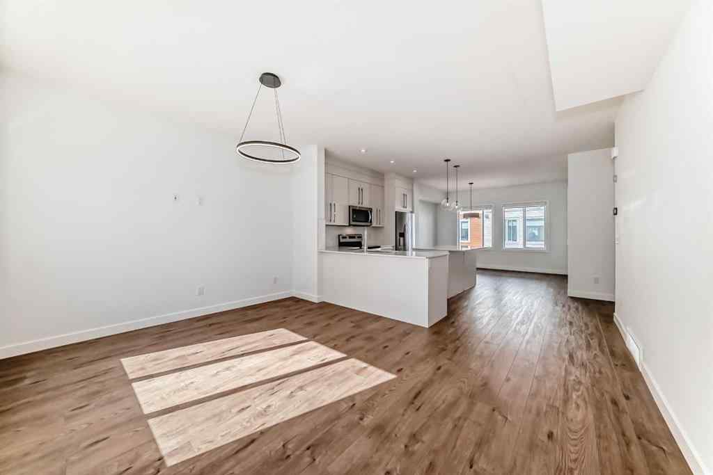 MLS® A2240680 - Unit #605 335 Creekside Boulevard SW in Pine Creek Calgary, Residential