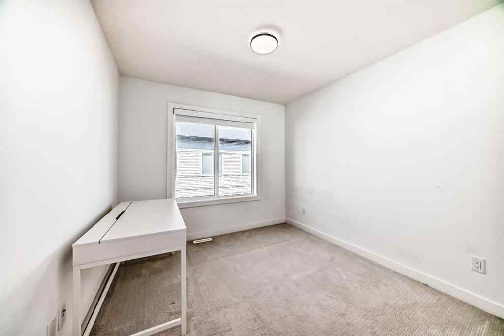 MLS® A2240680 - Unit #605 335 Creekside Boulevard SW in Pine Creek Calgary, Residential