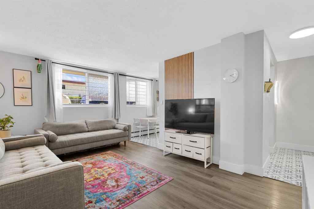 MLS® A2240684 - Unit #102 1143 37 Street SW in Rosscarrock Calgary, Residential