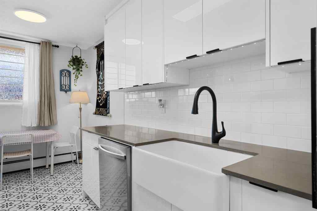 MLS® A2240684 - Unit #102 1143 37 Street SW in Rosscarrock Calgary, Residential