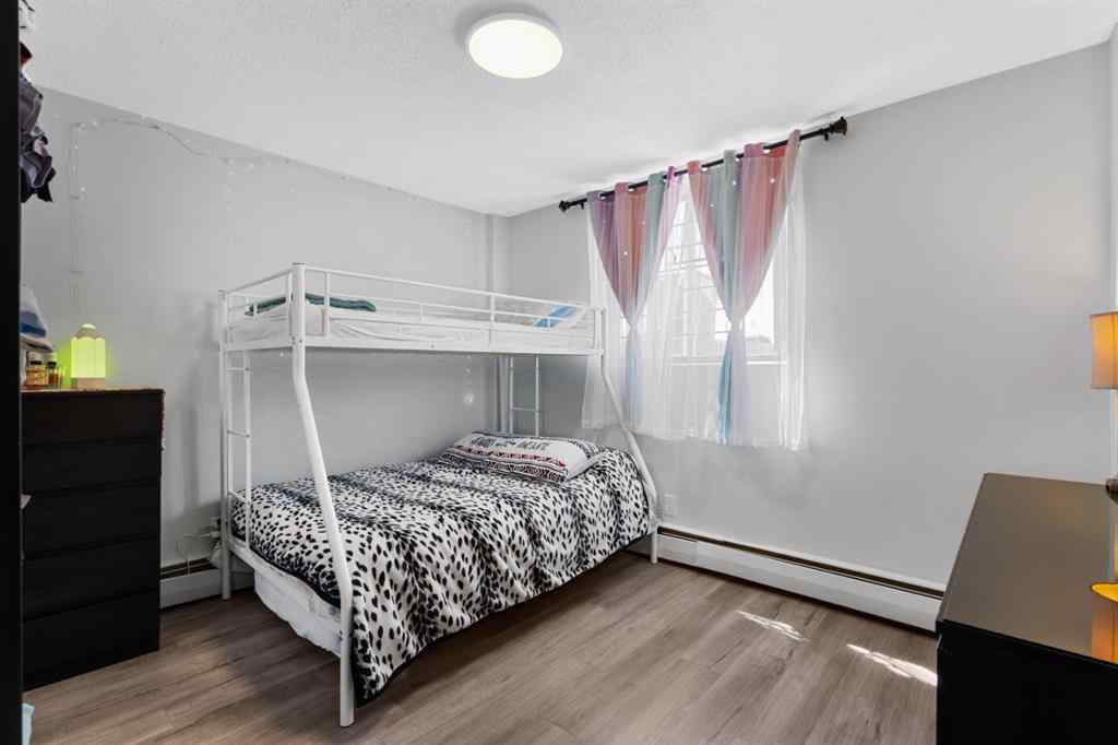 MLS® A2240684 - Unit #102 1143 37 Street SW in Rosscarrock Calgary, Residential