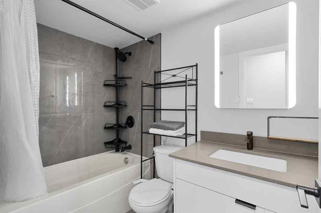 MLS® A2240684 - Unit #102 1143 37 Street SW in Rosscarrock Calgary, Residential