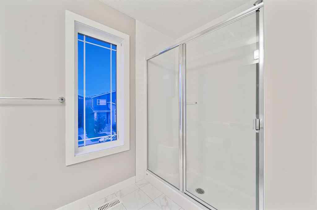 MLS® A2240761 - 26 Howse Row NE in Livingston Calgary, Residential