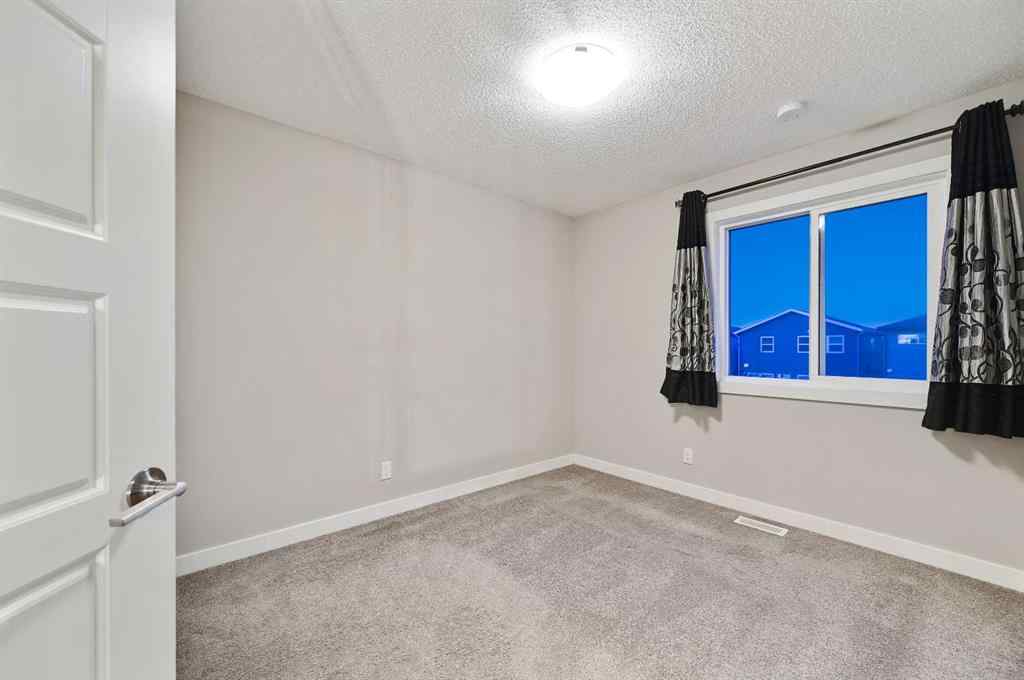 MLS® A2240761 - 26 Howse Row NE in Livingston Calgary, Residential
