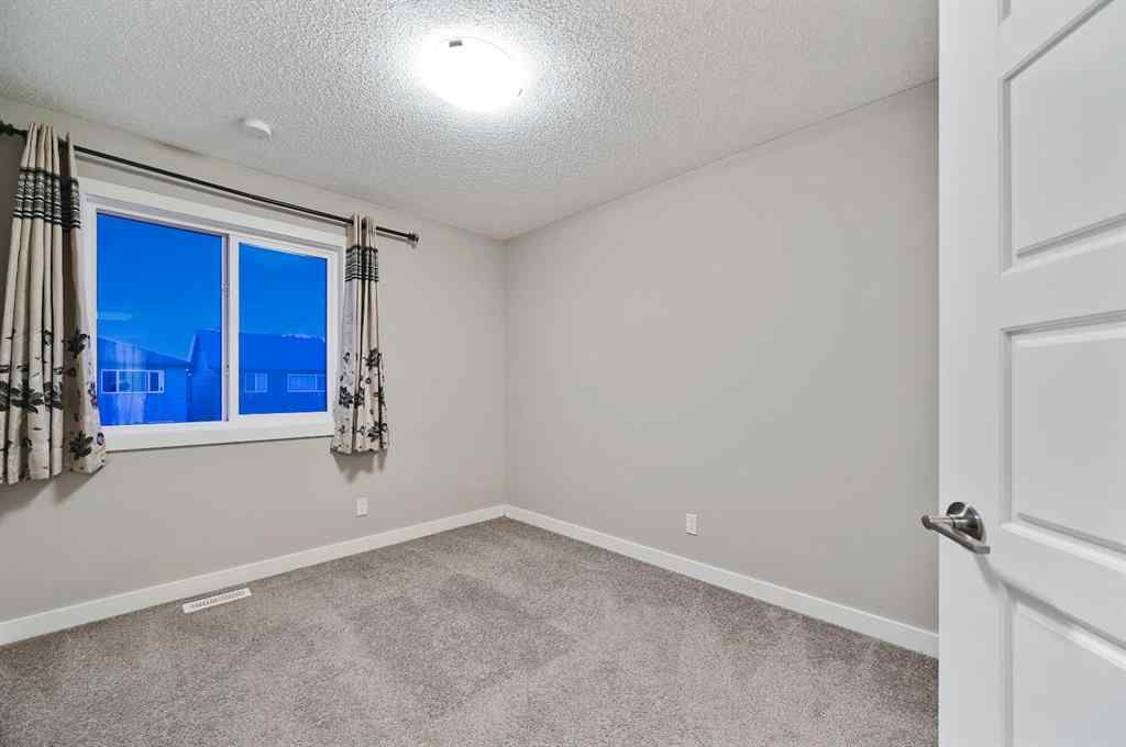 MLS® A2240761 - 26 Howse Row NE in Livingston Calgary, Residential