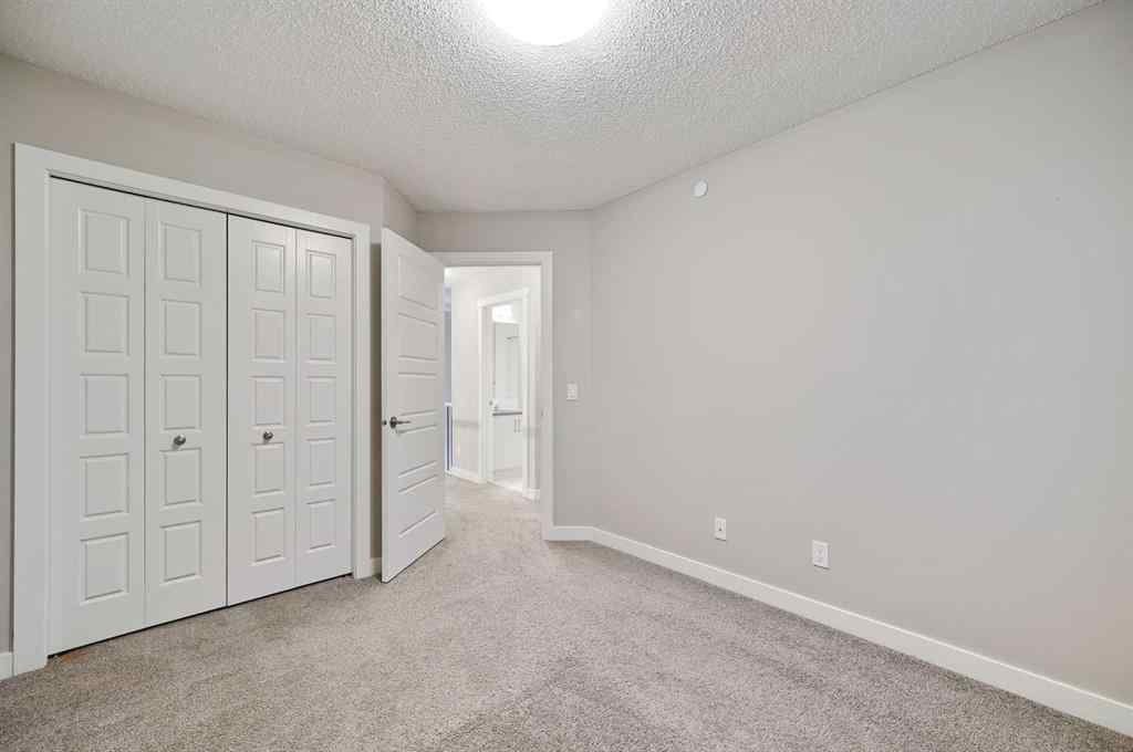 MLS® A2240761 - 26 Howse Row NE in Livingston Calgary, Residential