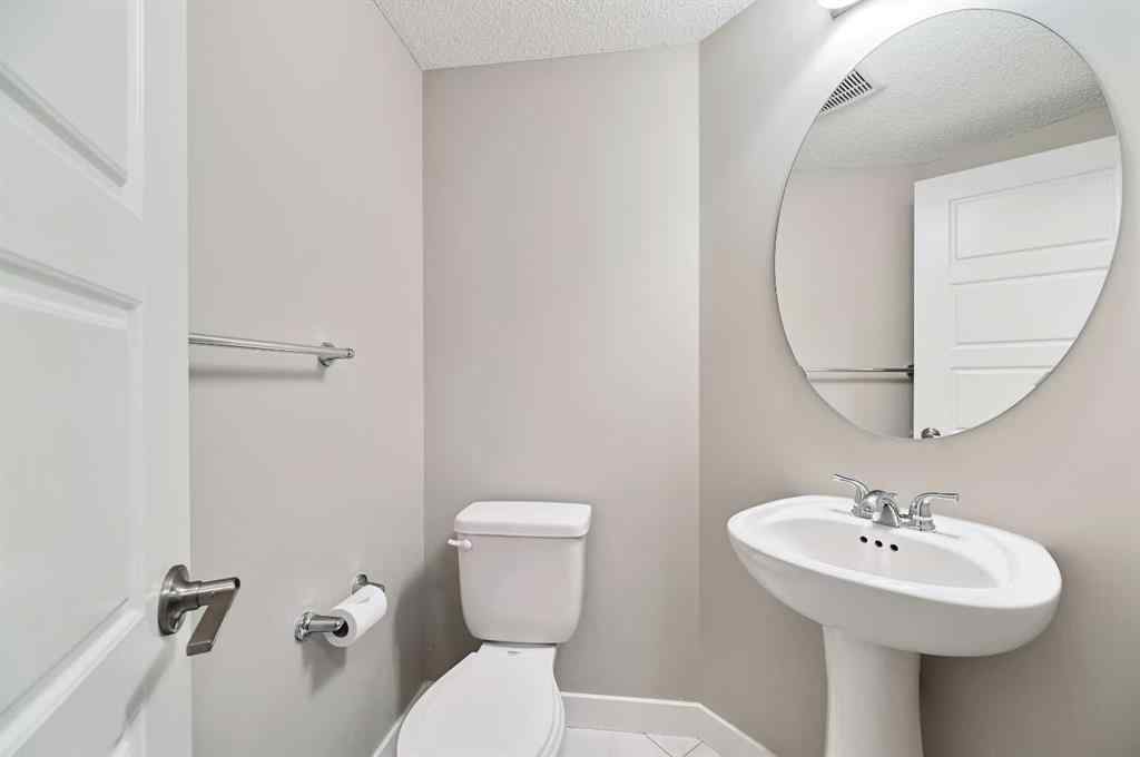MLS® A2240761 - 26 Howse Row NE in Livingston Calgary, Residential
