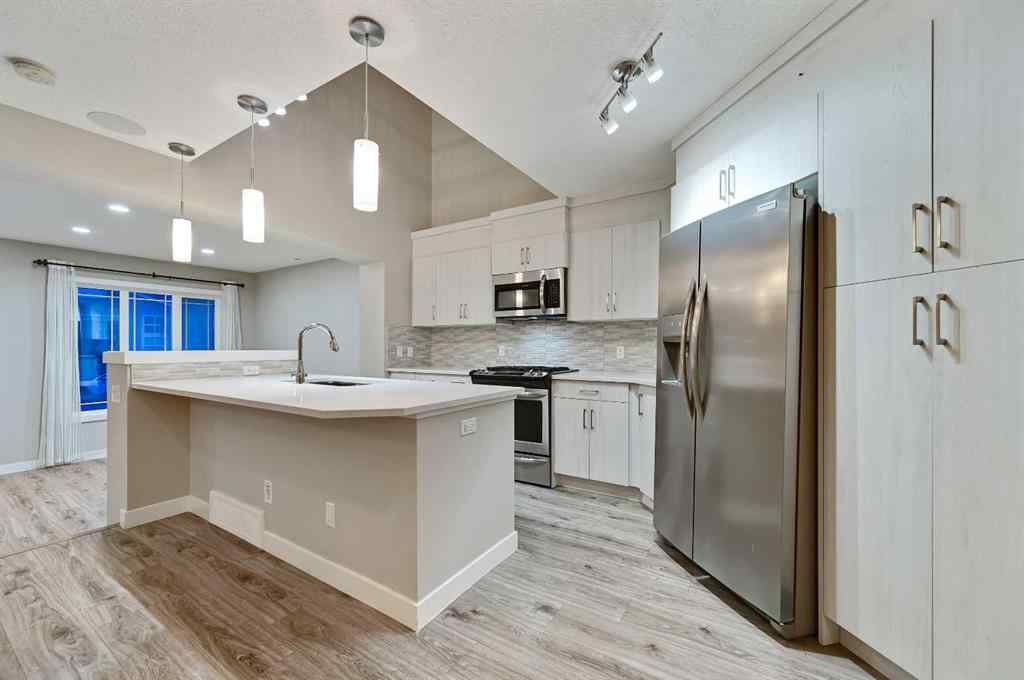 MLS® A2240761 - 26 Howse Row NE in Livingston Calgary, Residential