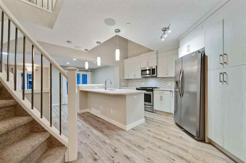 MLS® A2240761 - 26 Howse Row NE in Livingston Calgary, Residential