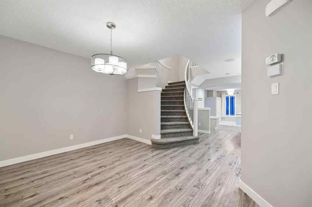 MLS® A2240761 - 26 Howse Row NE in Livingston Calgary, Residential