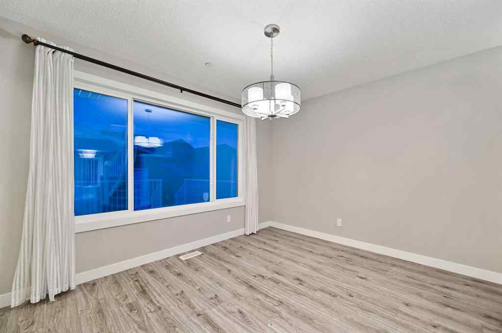 MLS® A2240761 - 26 Howse Row NE in Livingston Calgary, Residential