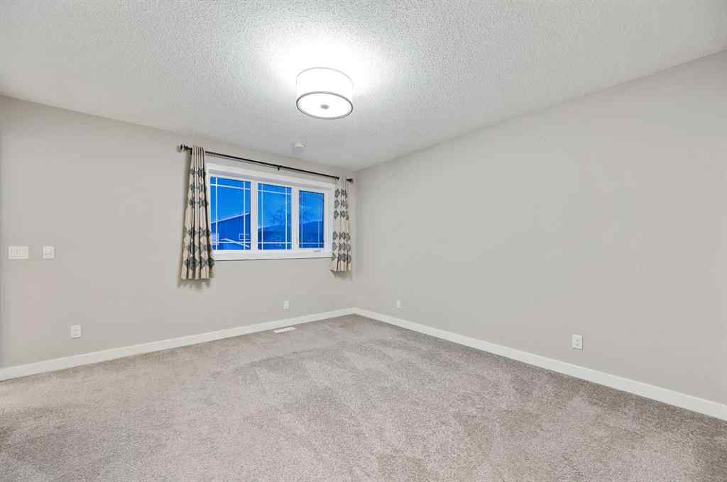 MLS® A2240761 - 26 Howse Row NE in Livingston Calgary, Residential