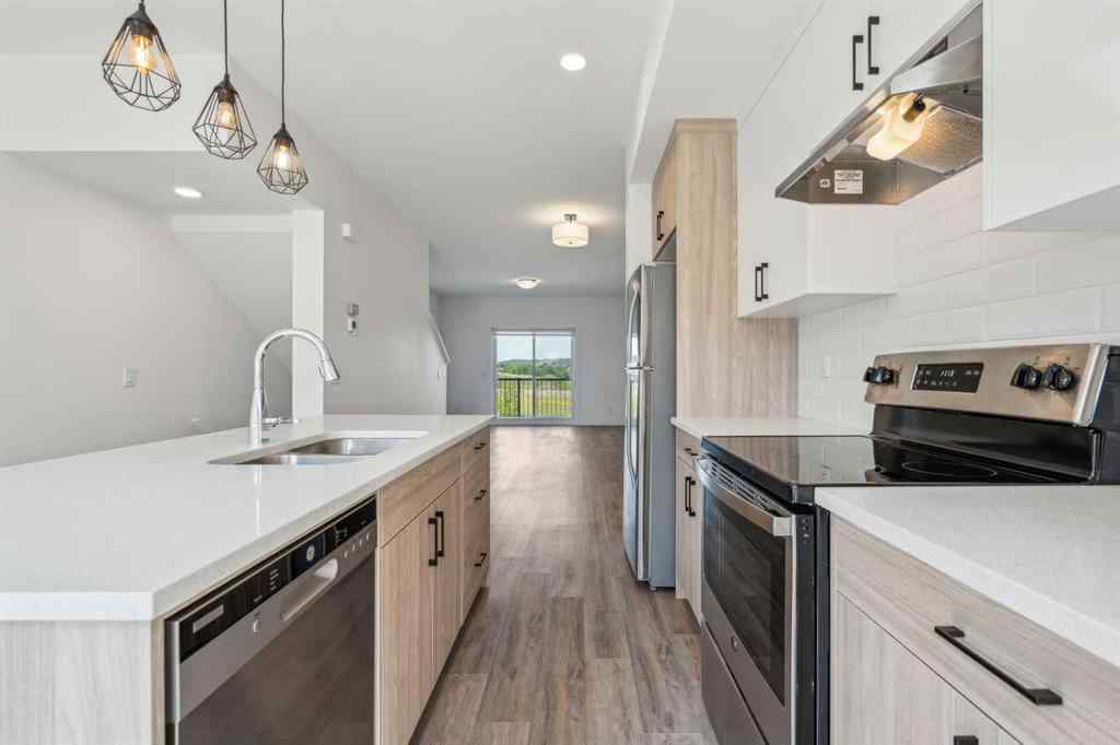 MLS® A2240842 - Unit #202 24 Rivercrest Drive  in Rivercrest Cochrane, Residential