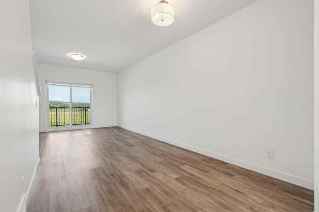 MLS® A2240842 - Unit #202 24 Rivercrest Drive  in Rivercrest Cochrane, Residential