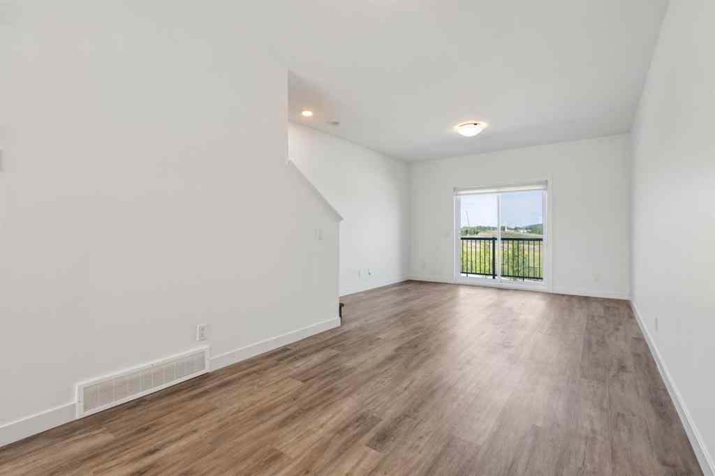MLS® A2240842 - Unit #202 24 Rivercrest Drive  in Rivercrest Cochrane, Residential