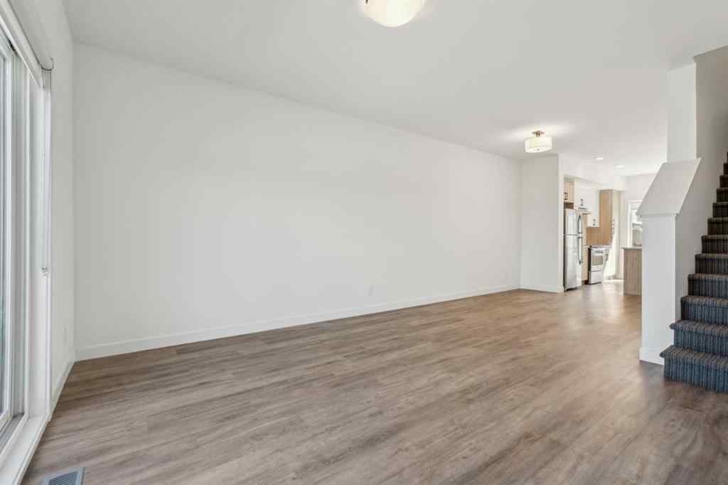 MLS® A2240842 - Unit #202 24 Rivercrest Drive  in Rivercrest Cochrane, Residential