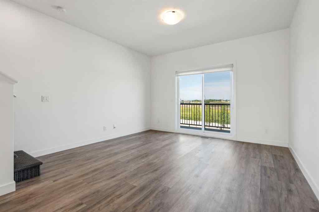 MLS® A2240842 - Unit #202 24 Rivercrest Drive  in Rivercrest Cochrane, Residential