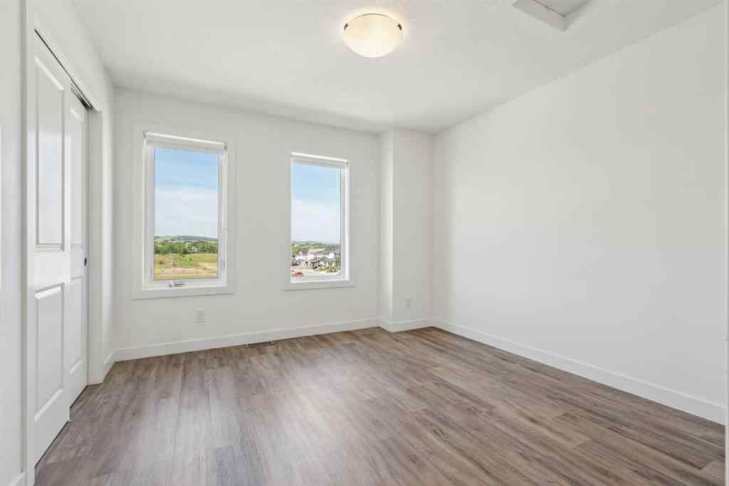 MLS® A2240842 - Unit #202 24 Rivercrest Drive  in Rivercrest Cochrane, Residential
