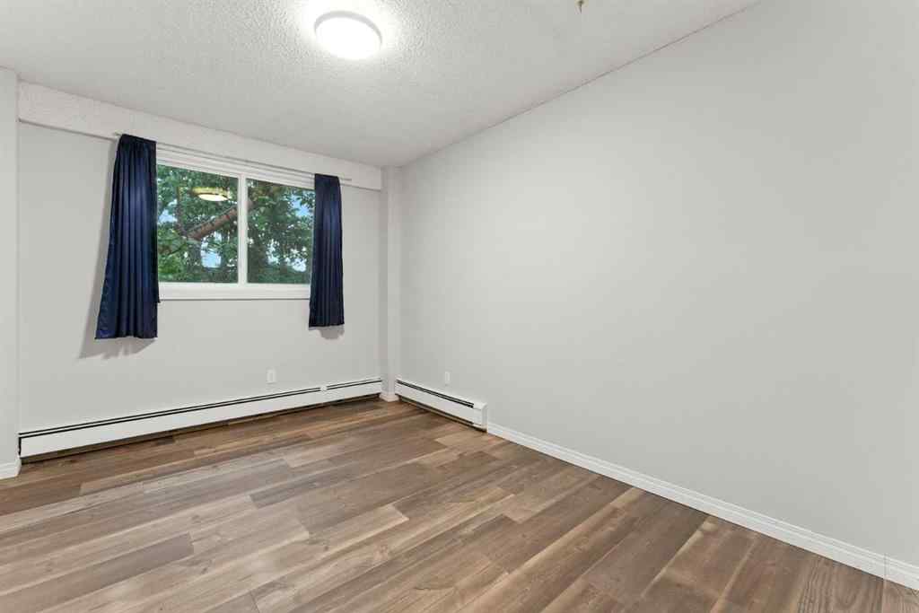 MLS® A2240855 - Unit #411 3420 50 Street NW in Varsity Calgary, Residential
