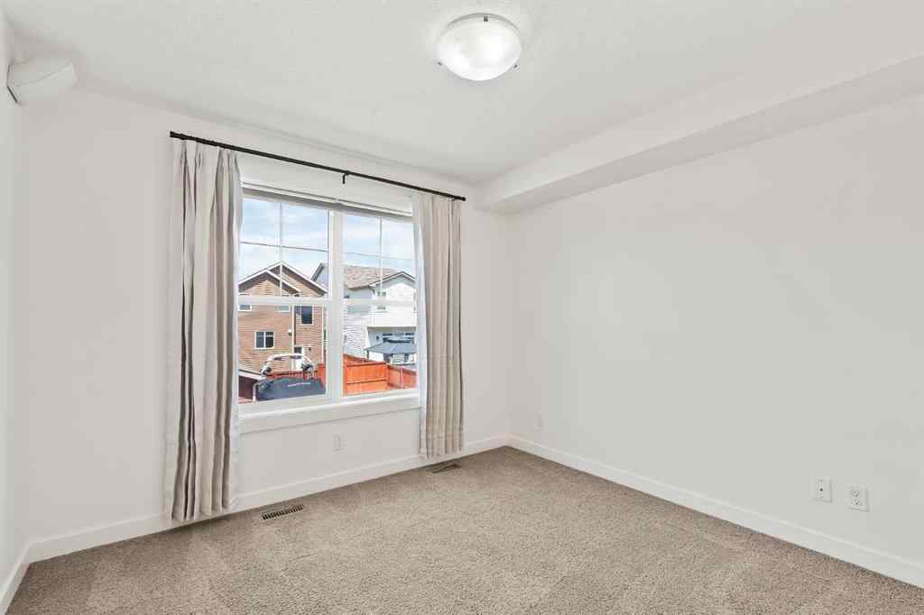 MLS® A2240890 - 113 Cranford Walk SE in Cranston Calgary, Residential