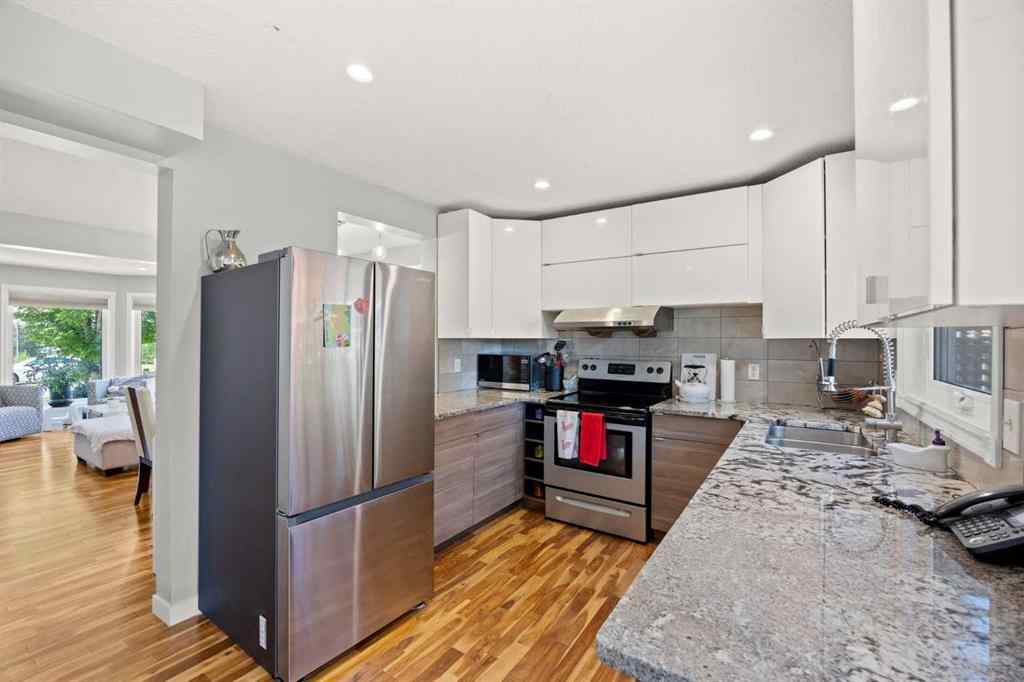 MLS® A2240905 - 139 Hawkville Close NW in Hawkwood Calgary, Residential