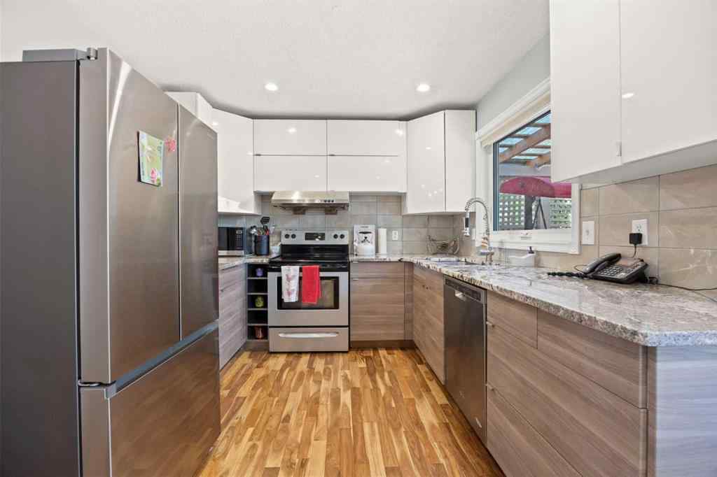 MLS® A2240905 - 139 Hawkville Close NW in Hawkwood Calgary, Residential